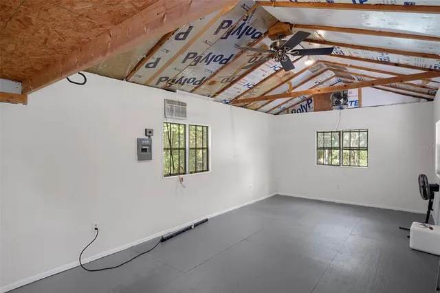 a backyard of a house with lots of green space