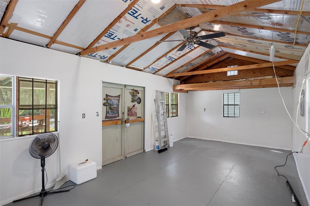 6176 South Hancock Road Homosassa, FL 34448 - Photo 20 of 33 a view of empty room with wooden floor