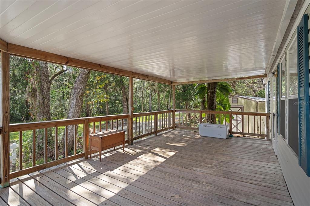 6176 South Hancock Road Homosassa, FL 34448 - Photo 2 of 33 a view of balcony with wooden floor