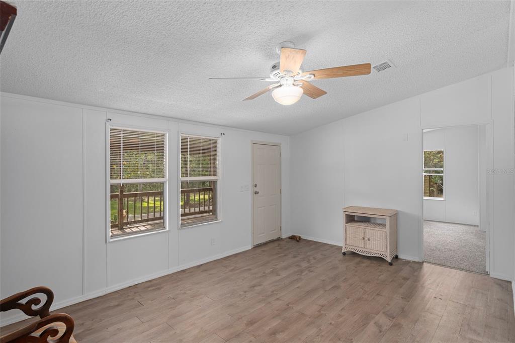 6176 South Hancock Road Homosassa, FL 34448 - Photo 5 of 33 a view of an empty room with a window