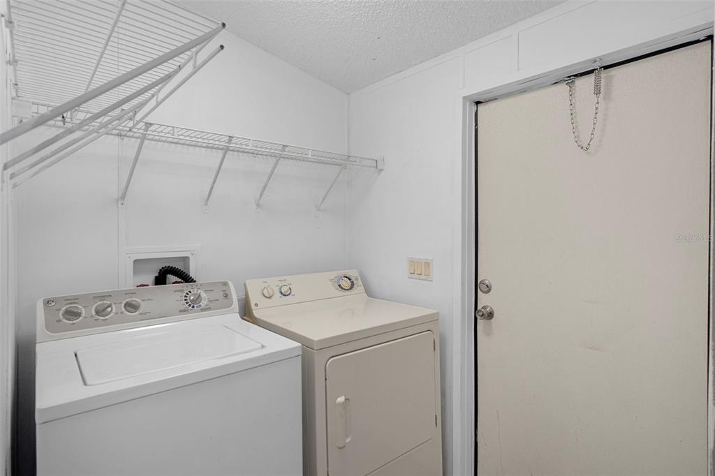 6176 South Hancock Road Homosassa, FL 34448 - Photo 9 of 33 a utility room with dryer and washer