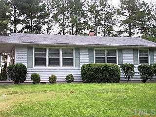 3320 Apache Drive Raleigh, NC 27609 - Photo 1 of 1 a front view of a house with a yard