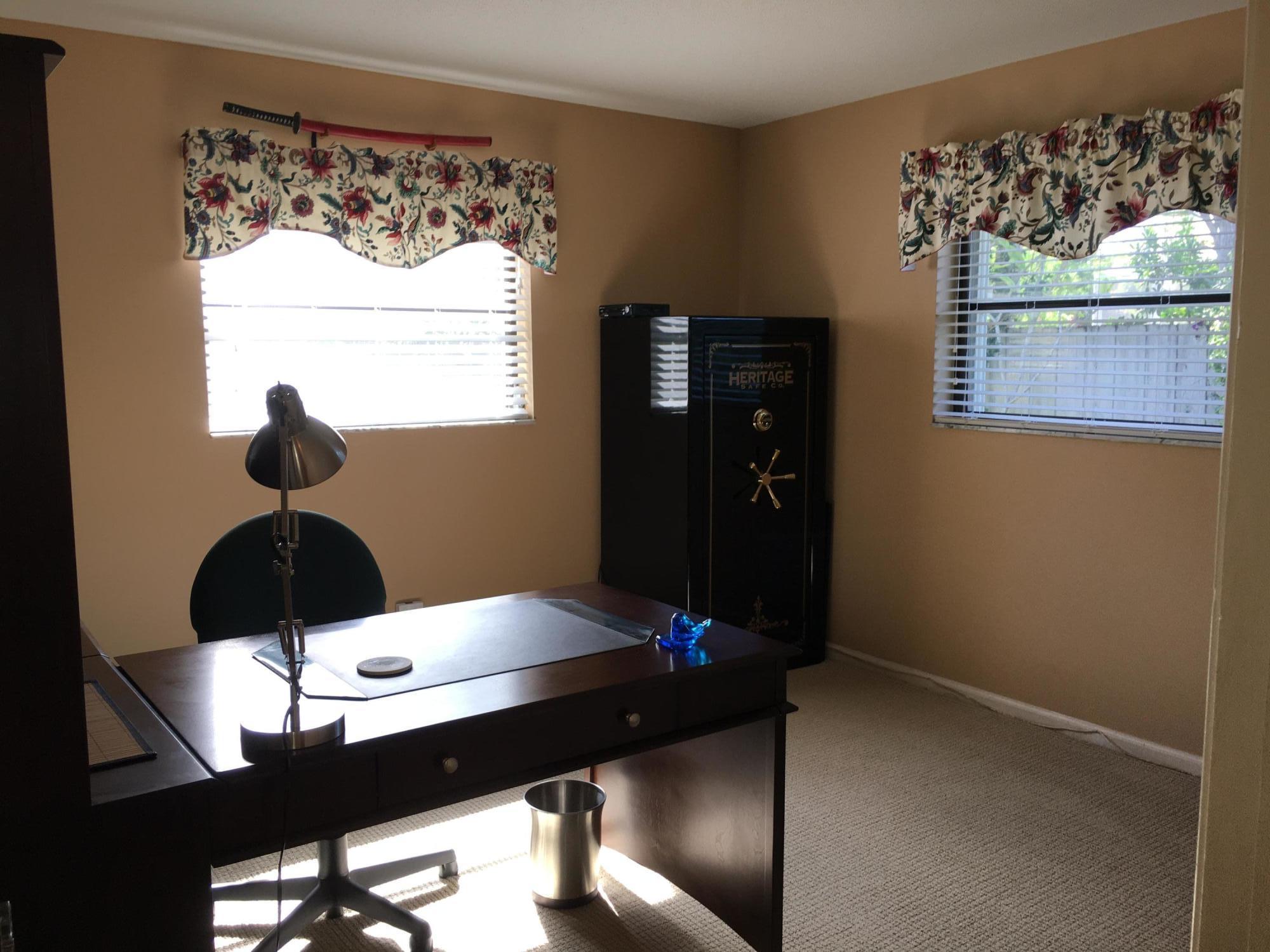 780 Southwest 17th Street Boca Raton, FL 33486 - Photo 30 of 37 a desk with chair and window