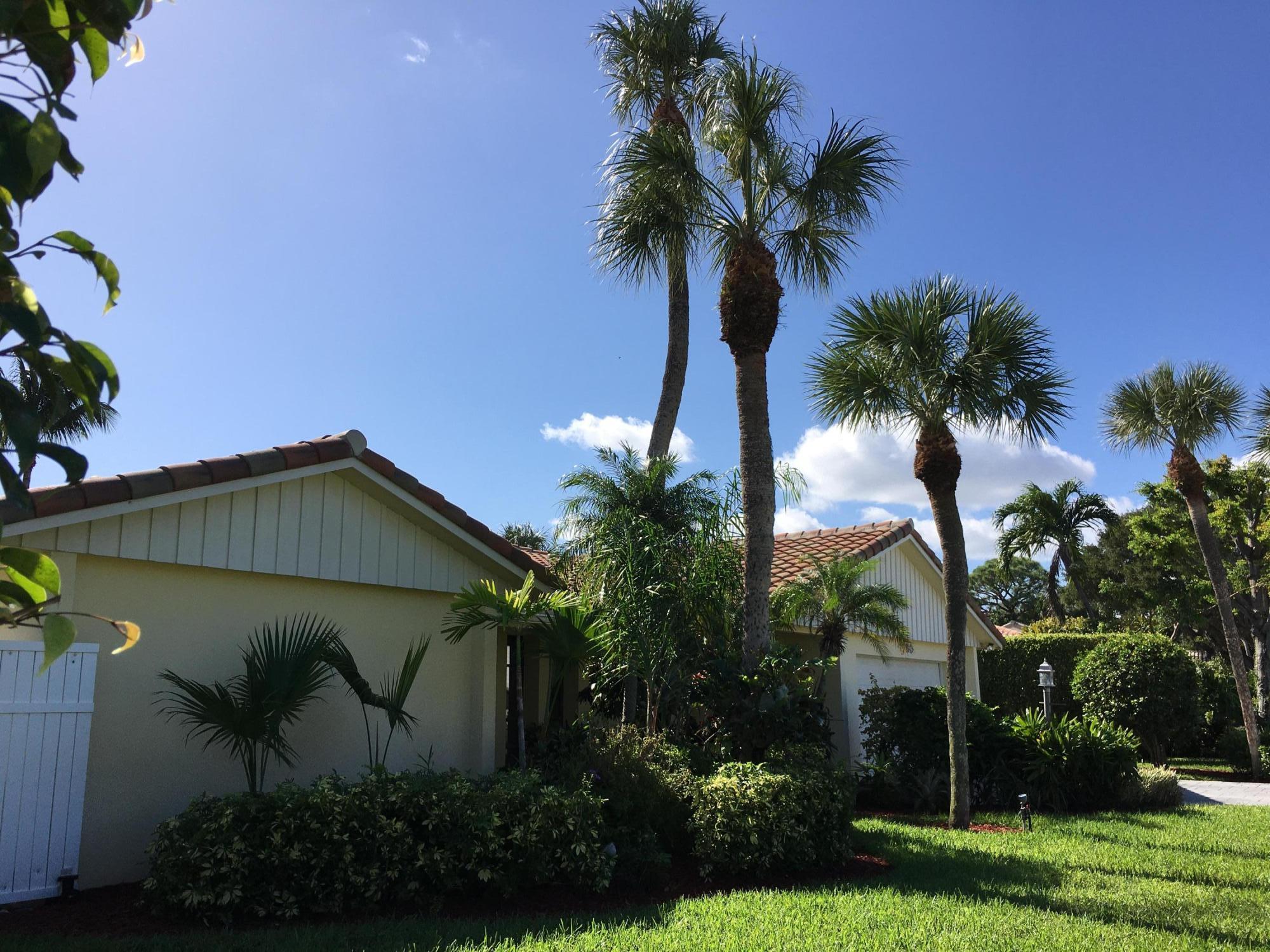 780 Southwest 17th Street Boca Raton, FL 33486 - Photo 3 of 37 a front view of house with a garden