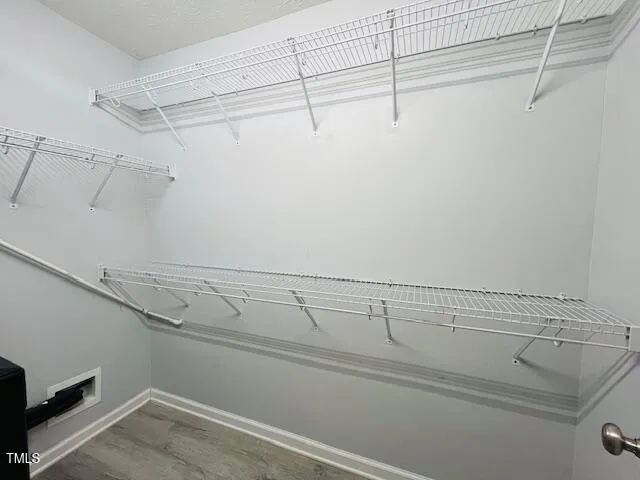 a view of a room with racks on the wall