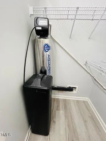 a view of entryway with wooden floor