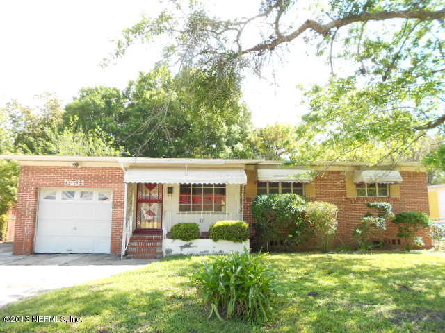 5431 Cleveland Road Jacksonville, FL 32209 - Photo 1 of 15 a view of a house with a yard