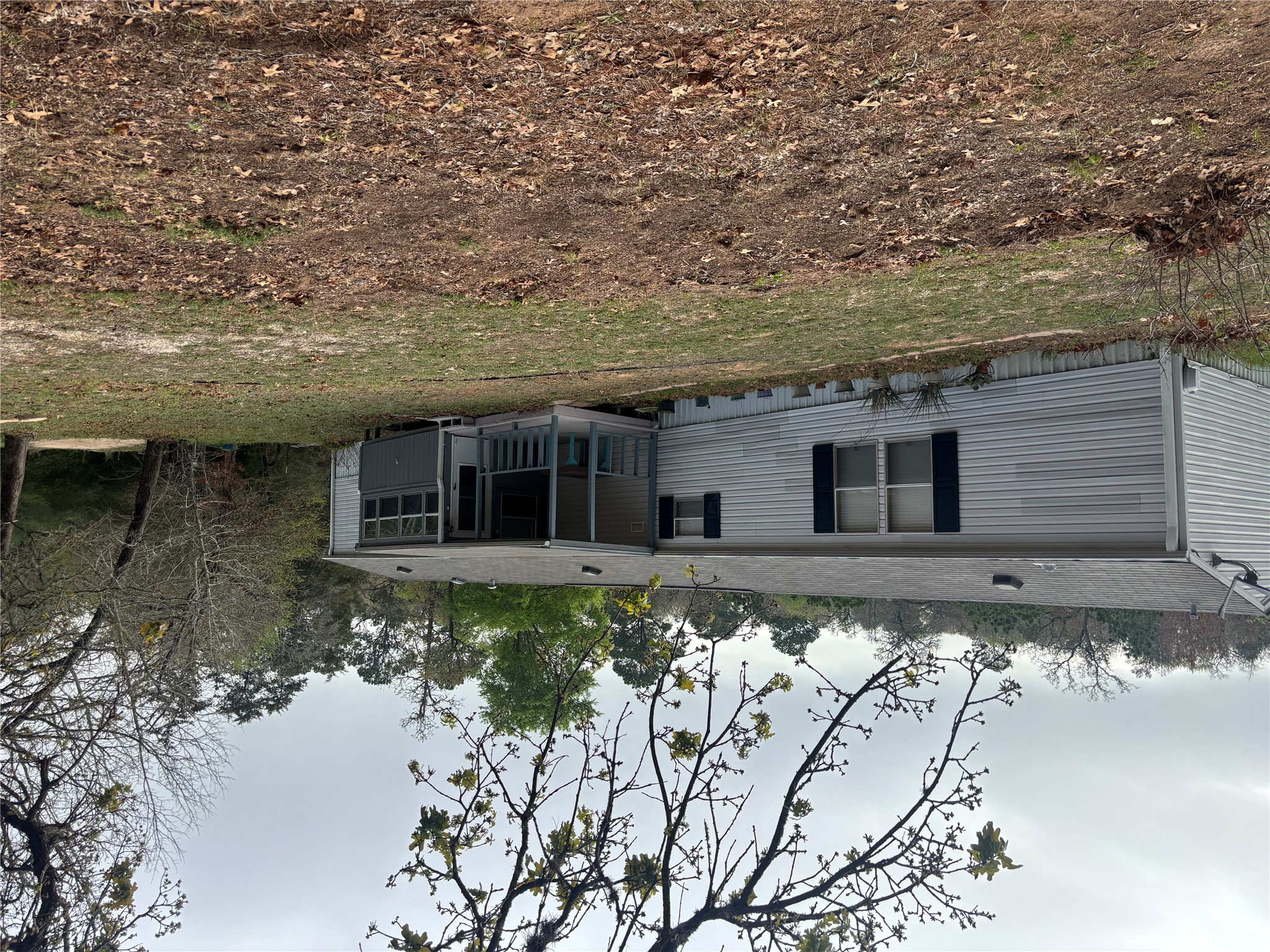 a house with trees in the background