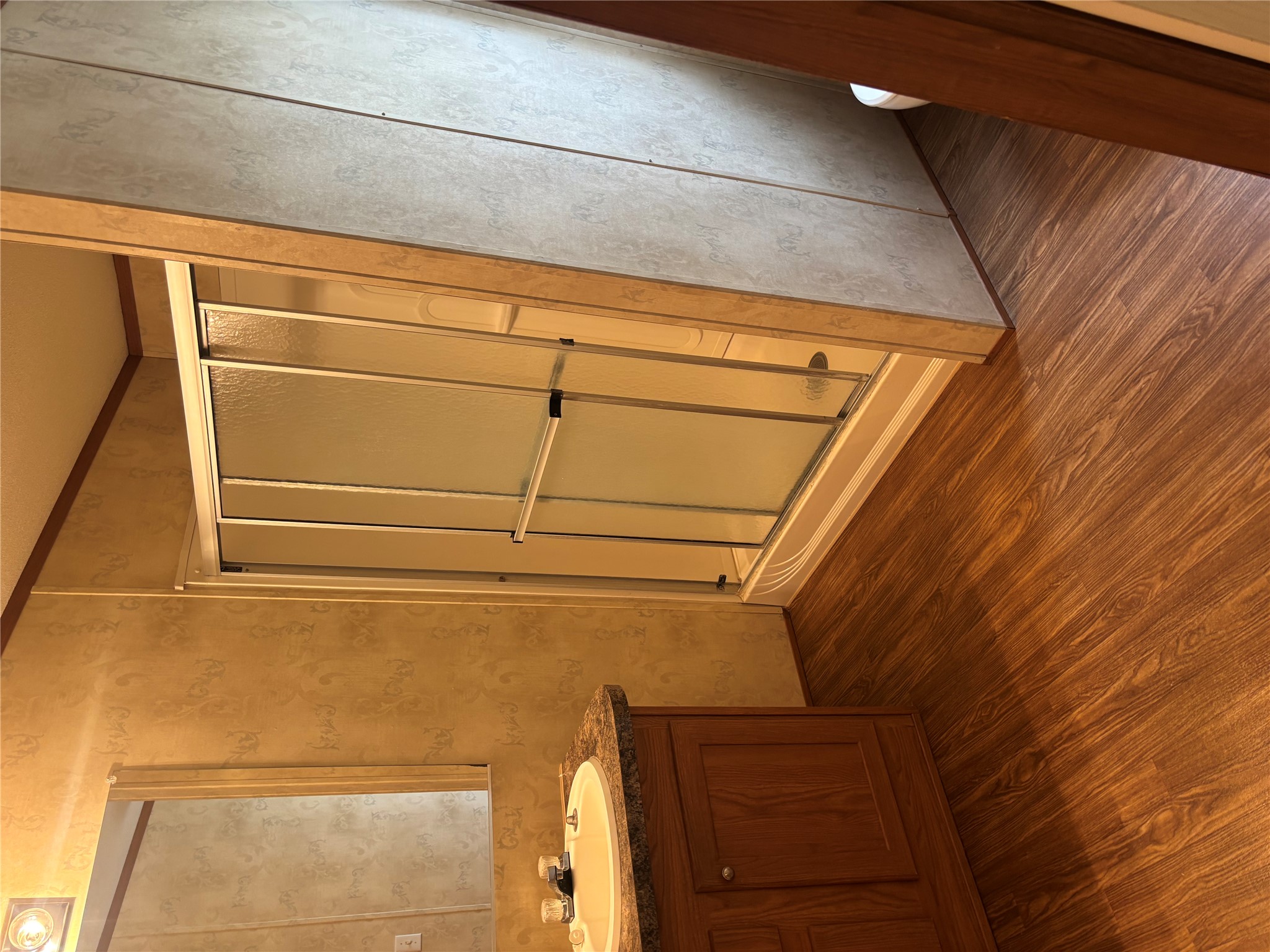 151 Cottle Town Road Smithville, TX 78957 - Photo 13 of 22 a view of a bathroom with a sink and a mirror