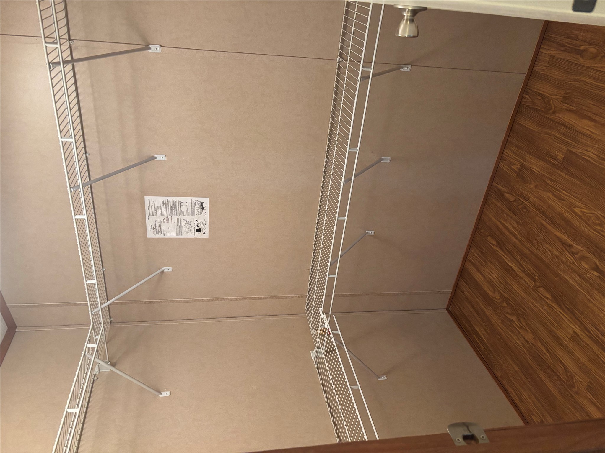 151 Cottle Town Road Smithville, TX 78957 - Photo 19 of 22 a view of a room with racks on the wall