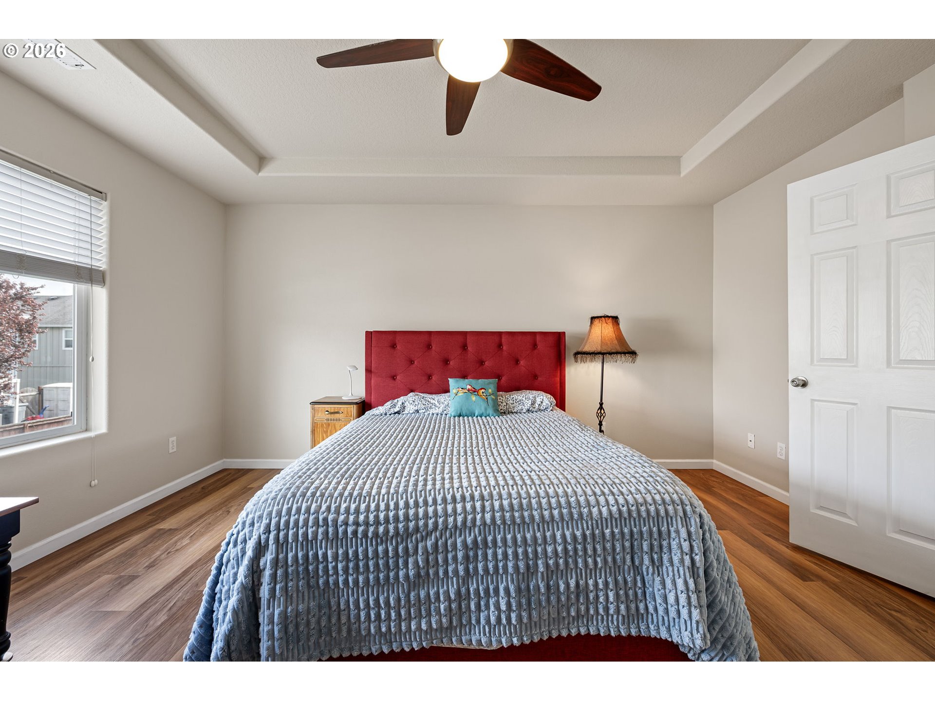 265 Southeast Casting Street Albany, OR 97322 - Photo 20 of 48 a bedroom with a bed and wooden floor