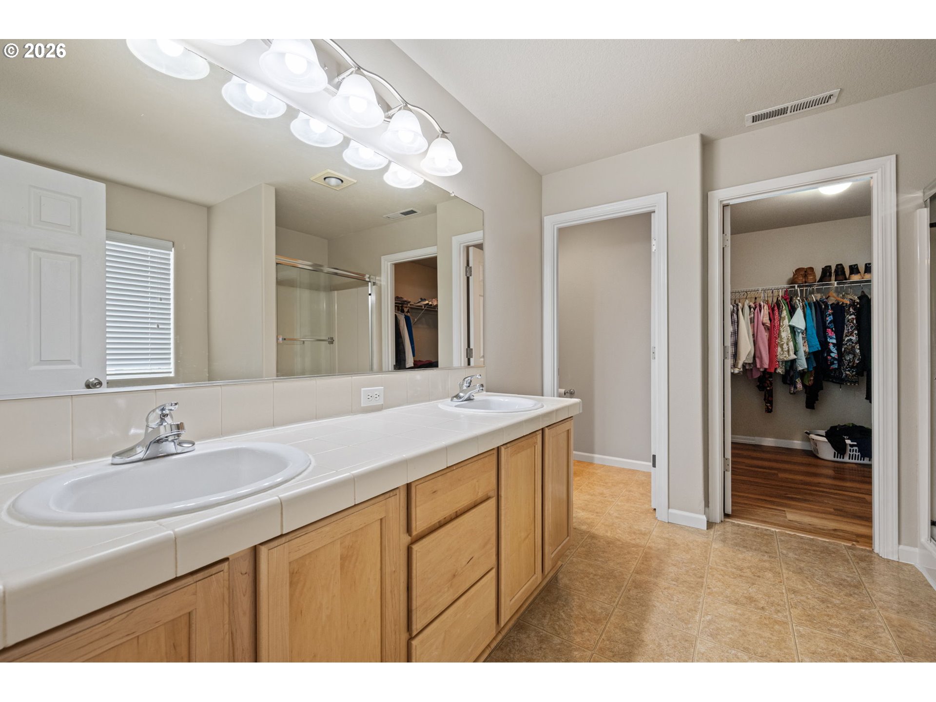 265 Southeast Casting Street Albany, OR 97322 - Photo 21 of 48 a bathroom with a sink vanity and a mirror