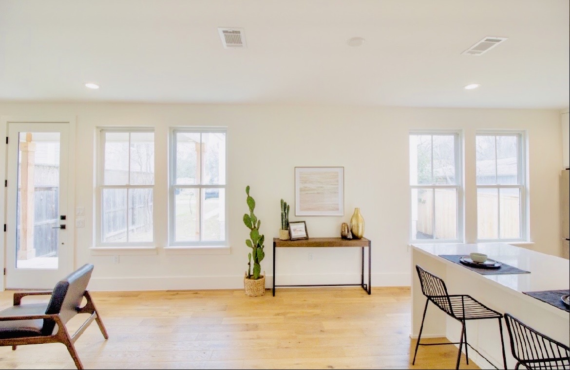 1903 West 30th Street Austin, TX 78703 - Photo 7 of 12 a living room with furniture and floor to ceiling windows