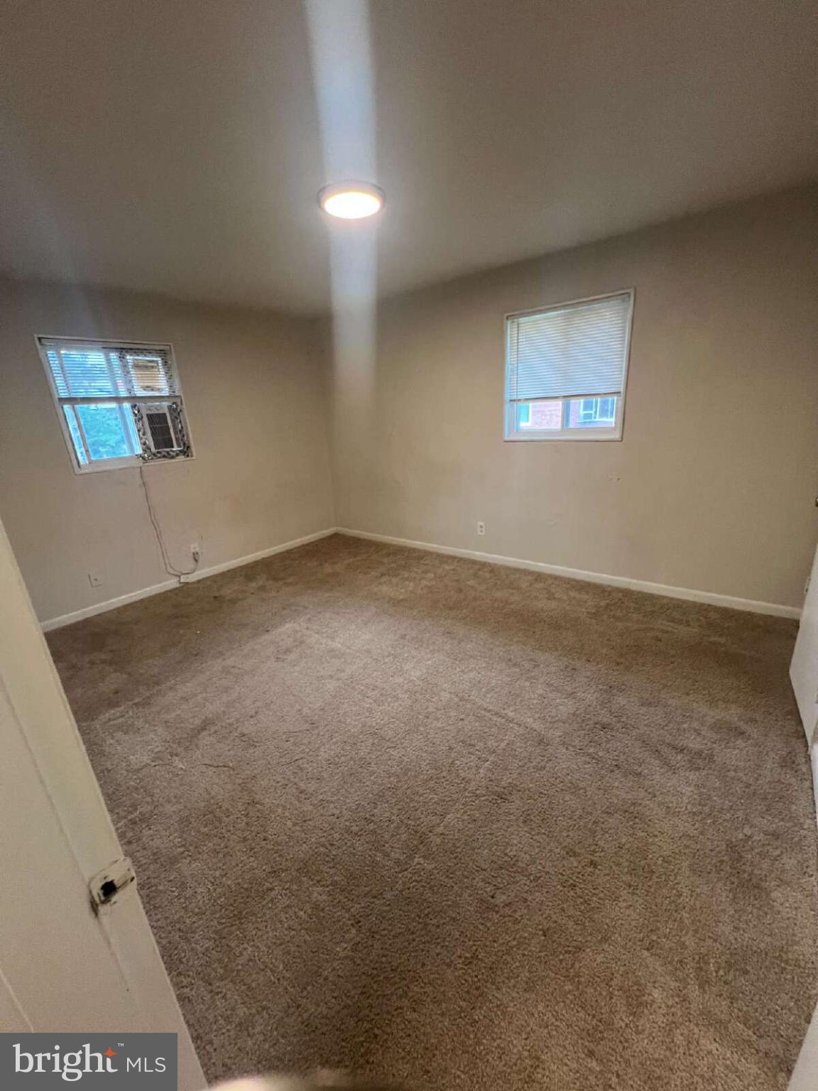 14404 Gemstone Drive, Unit 302 Woodbridge, VA 22191 - Photo 14 of 16 an empty room with a workbench