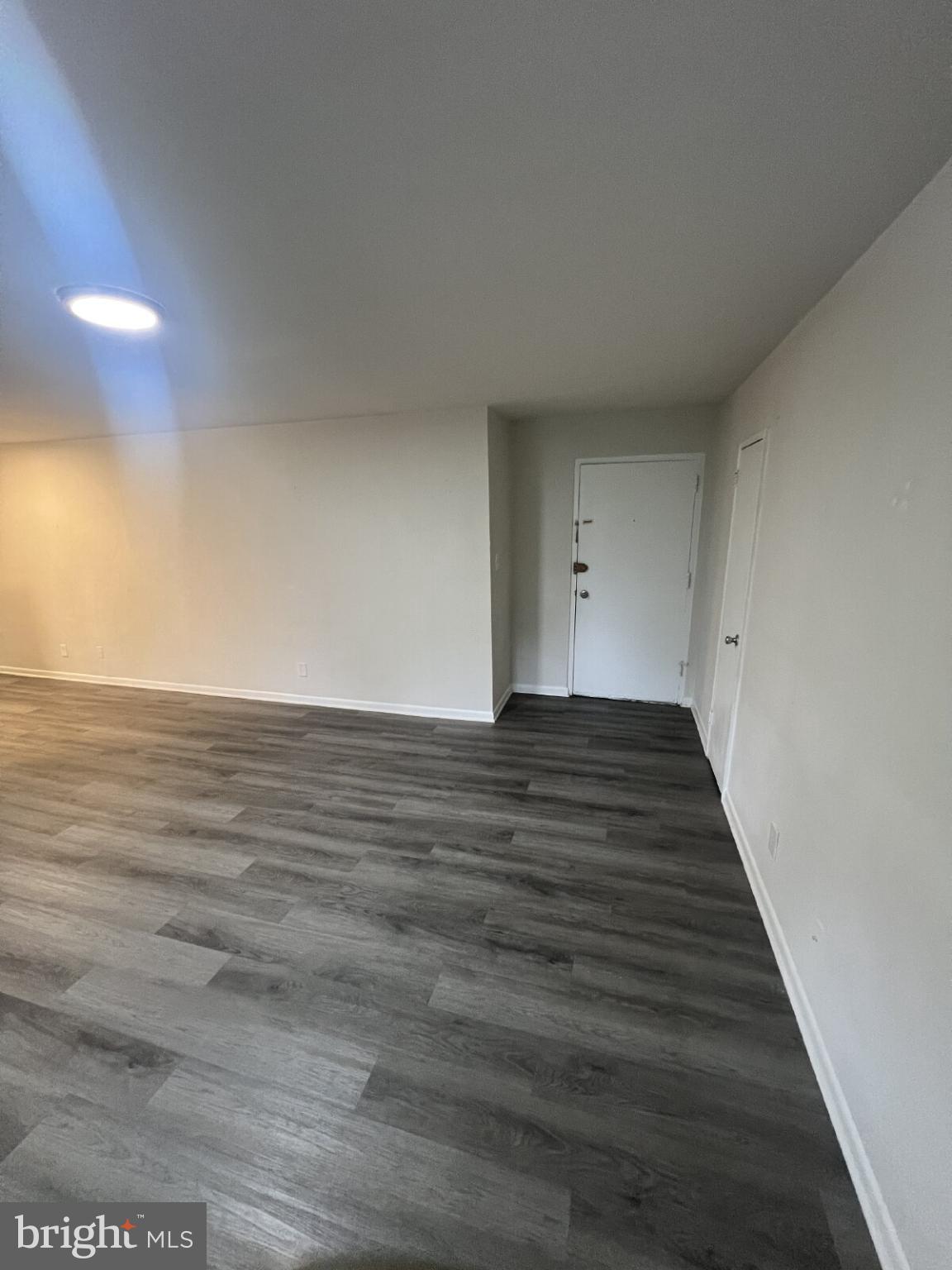 14404 Gemstone Drive, Unit 302 Woodbridge, VA 22191 - Photo 9 of 16 a view of room with wooden floor