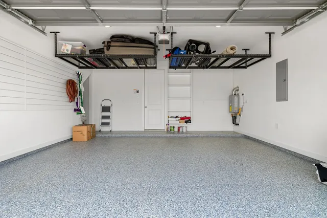 a view of a porch with a floor to ceiling windows and a table