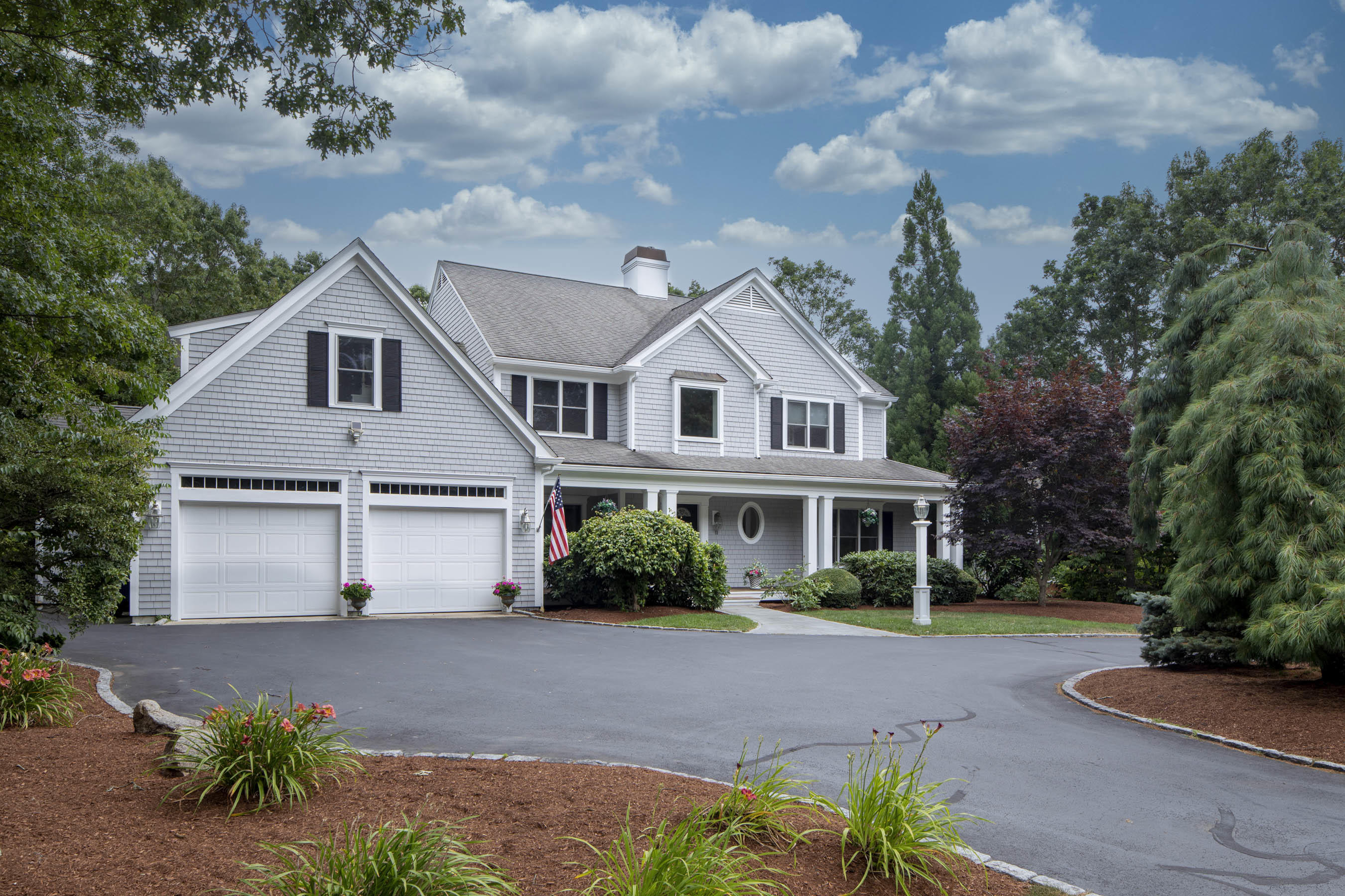11 Reflection Drive Sandwich, MA 02563 - Photo 1 of 24 a front view of a house with a garden