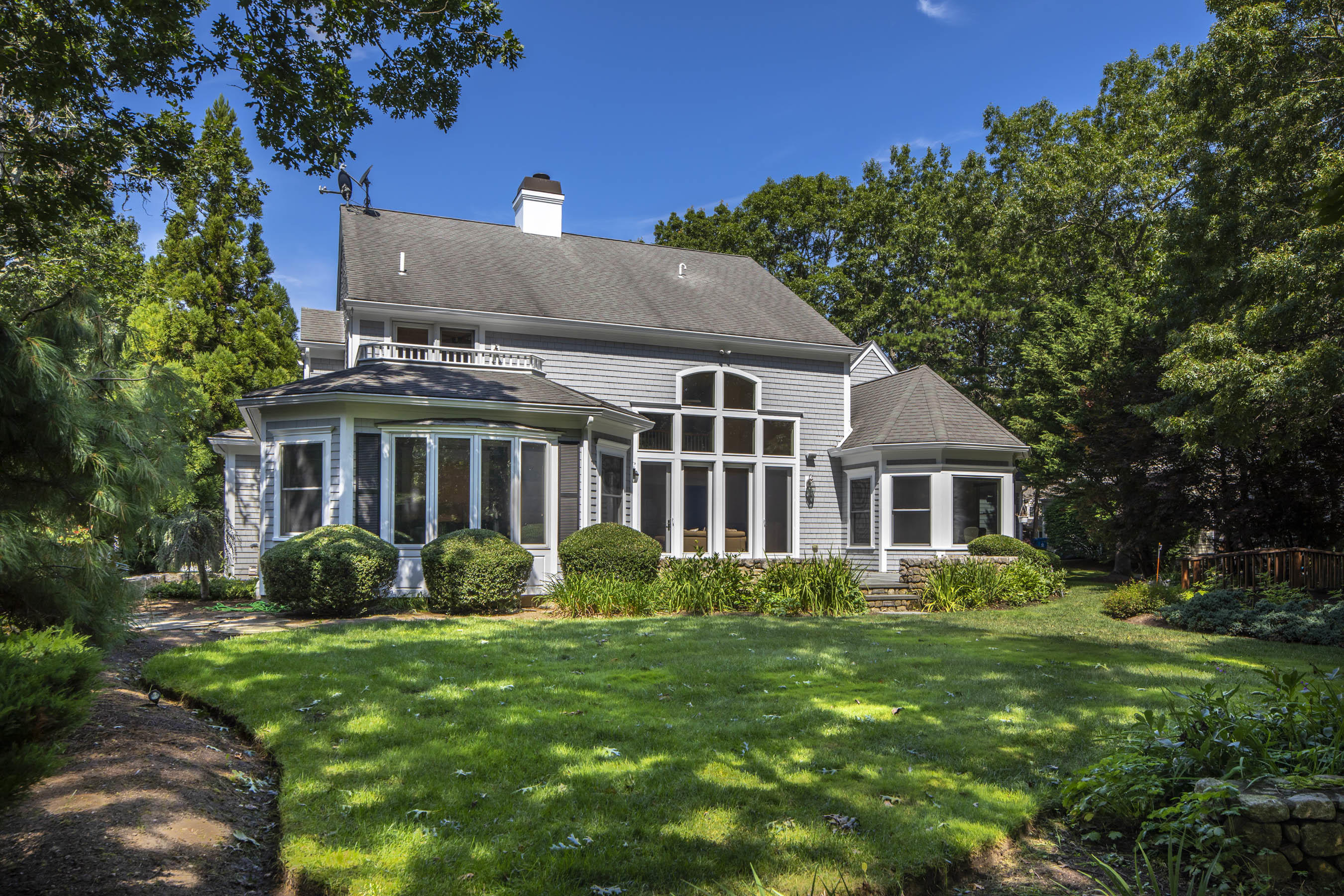 11 Reflection Drive Sandwich, MA 02563 - Photo 22 of 24 a front view of a house with a yard
