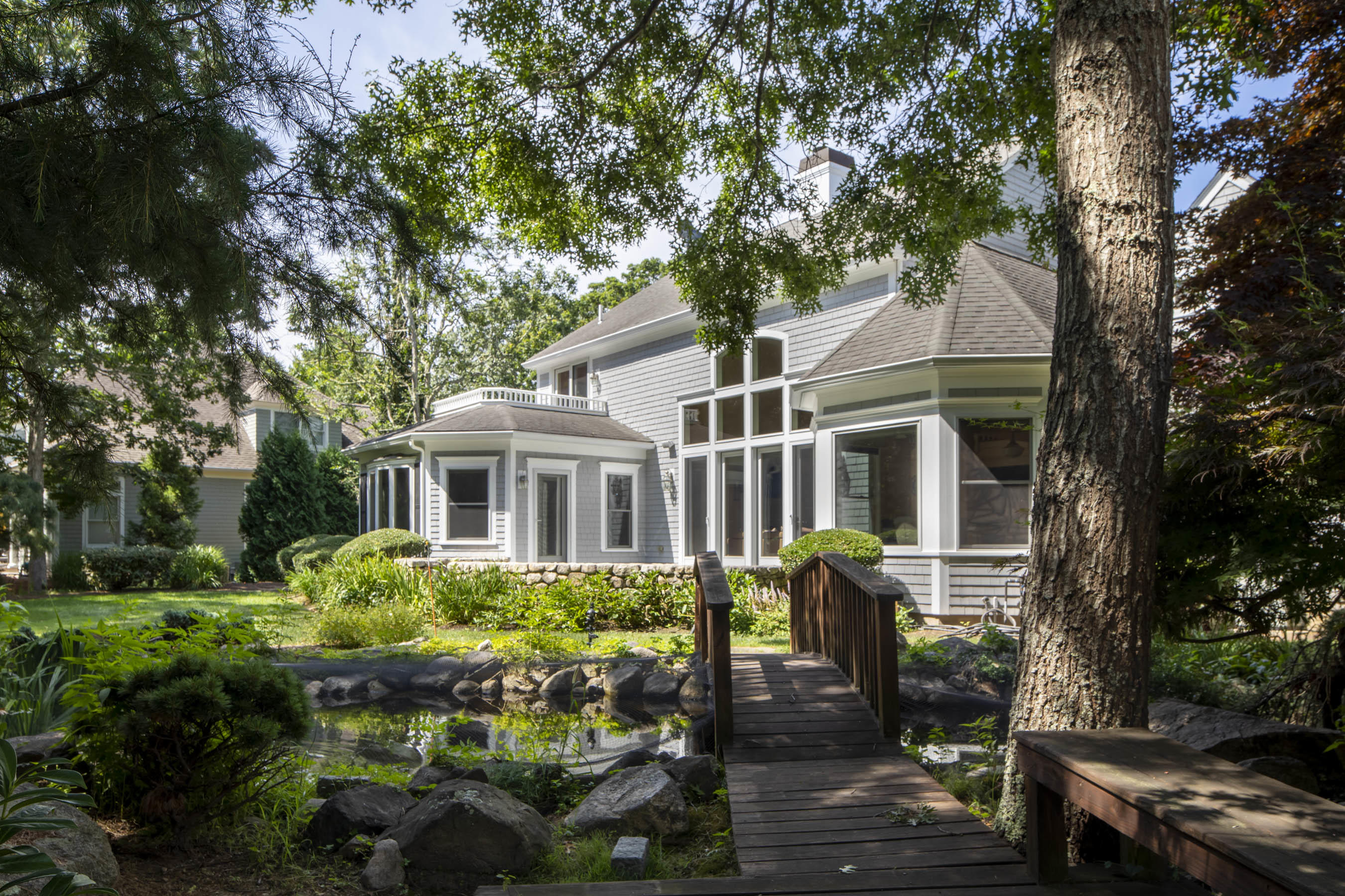 11 Reflection Drive Sandwich, MA 02563 - Photo 24 of 24 a front view of a house with a garden