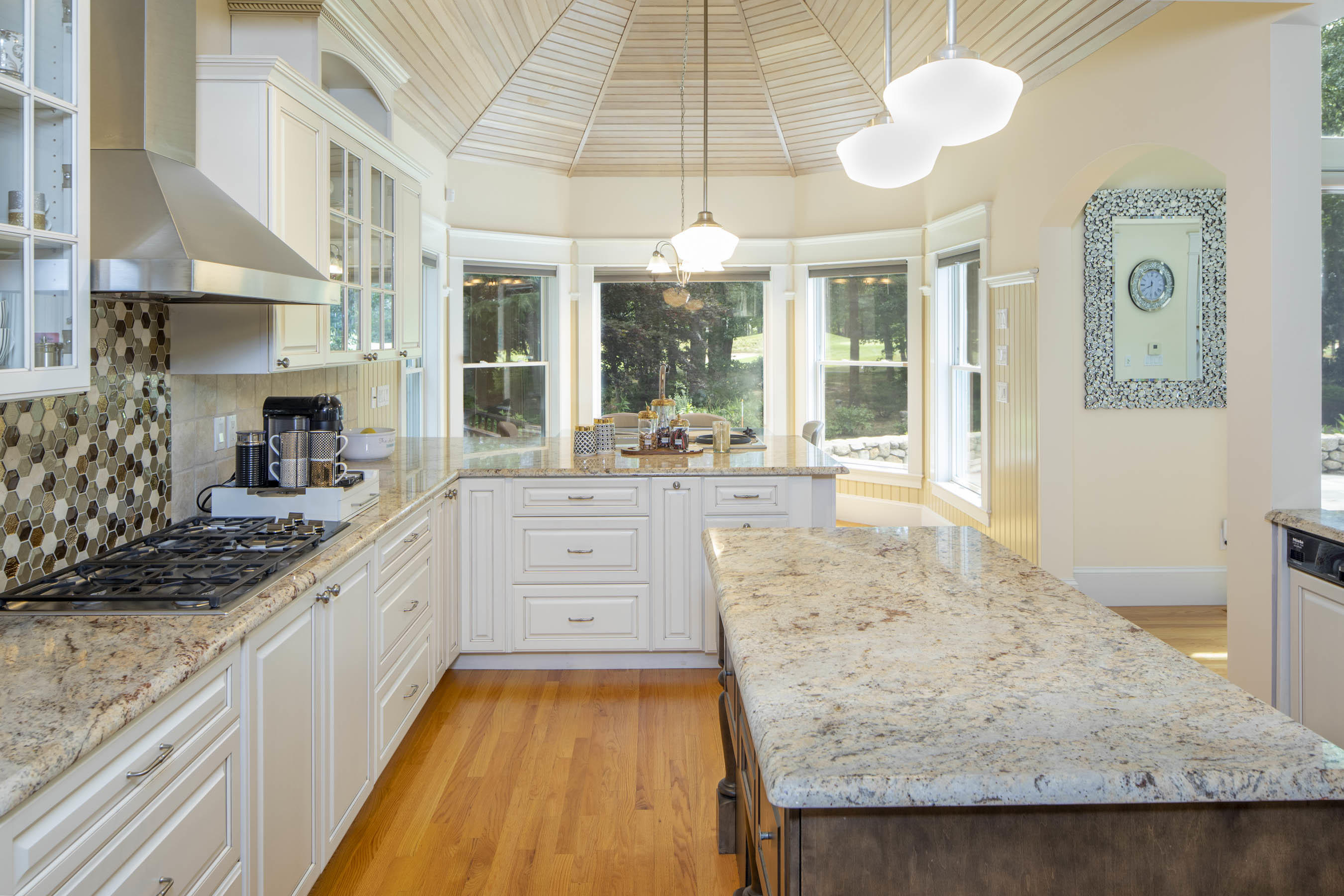 11 Reflection Drive Sandwich, MA 02563 - Photo 7 of 24 a large kitchen with kitchen island granite countertop a large window