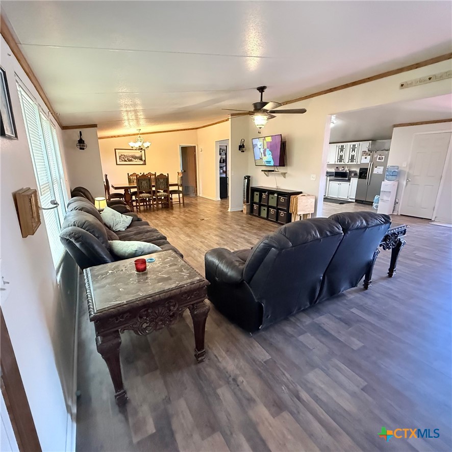 850 Blakely Road Gatesville, TX 76528 - Photo 20 of 32 a living room with furniture and a flat screen tv