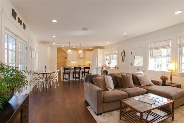 25 Barnes Hill Road Concord, MA 01742 - Photo 3 of 22 a living room with furniture wooden floor and a floor to ceiling window