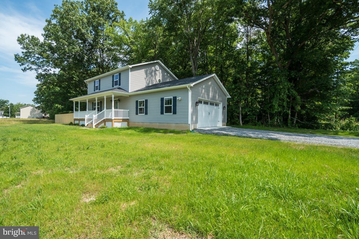 Richmond Road Colonial Beach, VA 22443 - Photo 2 of 28 This Pic shows side garage ; but will be Front