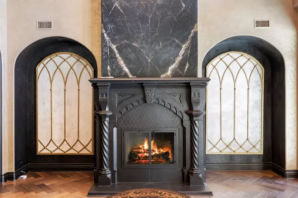 a spacious bedroom with a bed dresser and a large window