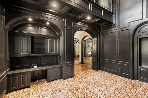 a view of walk in closet with clothes