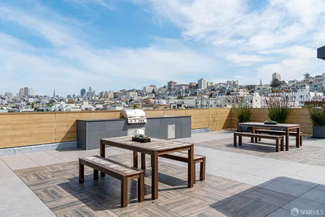 a balcony with a city view