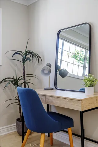 a view of a dining room with furniture and window