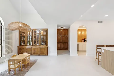 a view of a livingroom with furniture and windows