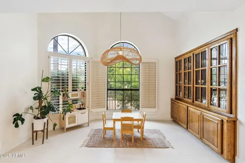 a living room with large windows