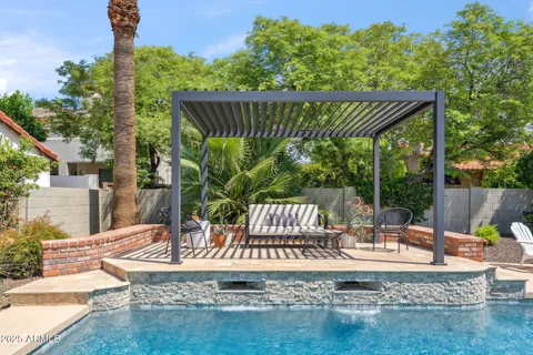 a view of a table and chairs in patio