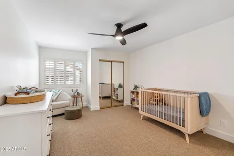 a room with a bed and a window