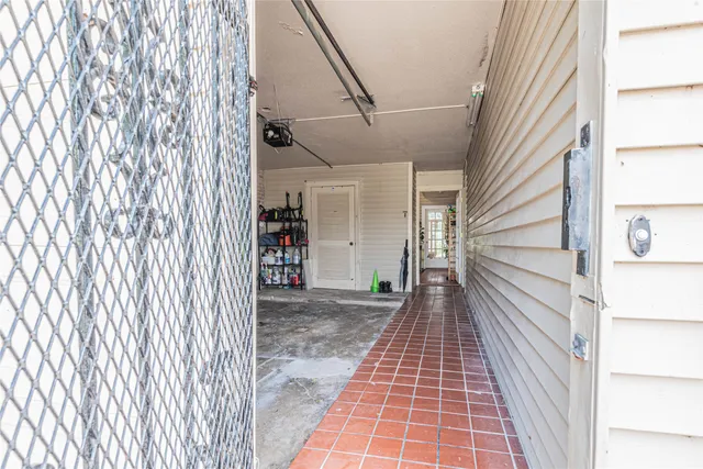 a view of a balcony with wooden floor and stairs