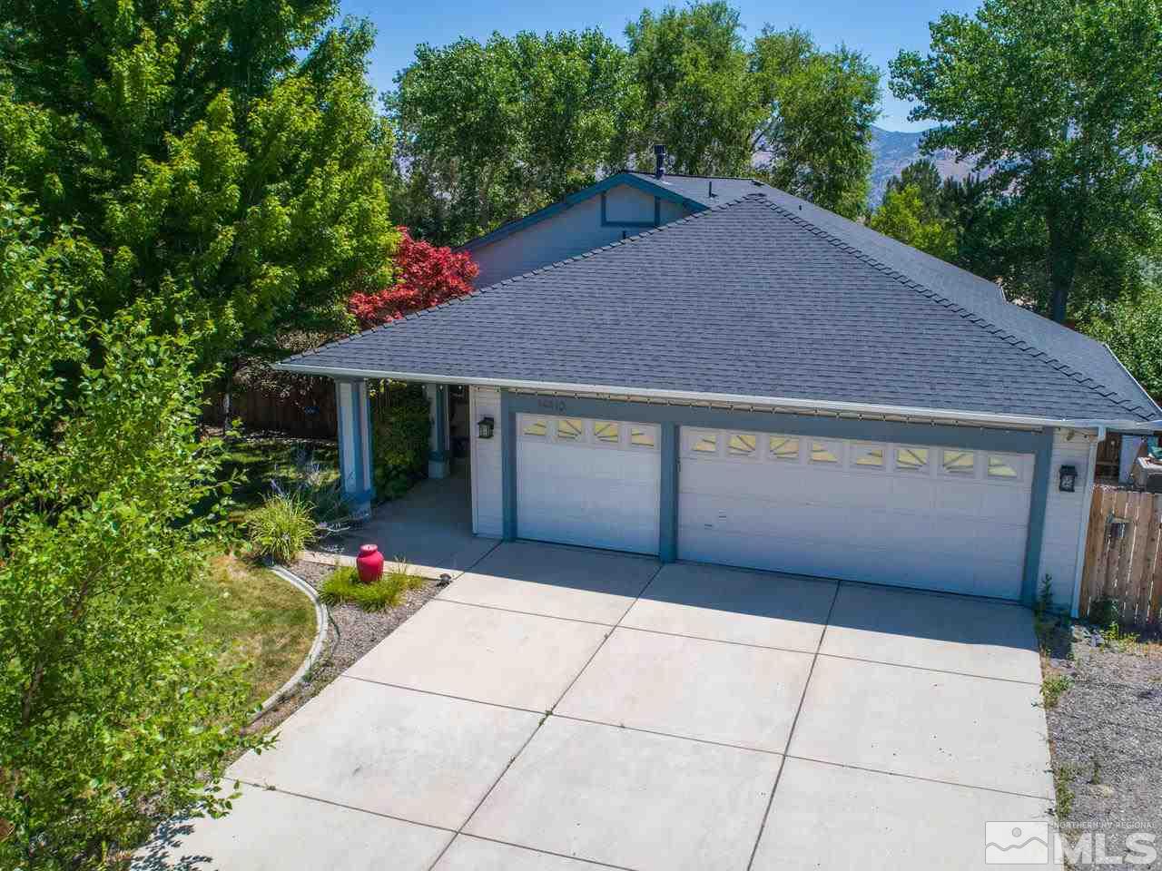 14410 Ghost Rider Drive Reno, NV 89511 - Photo 1 of 25 a house view with a garden space