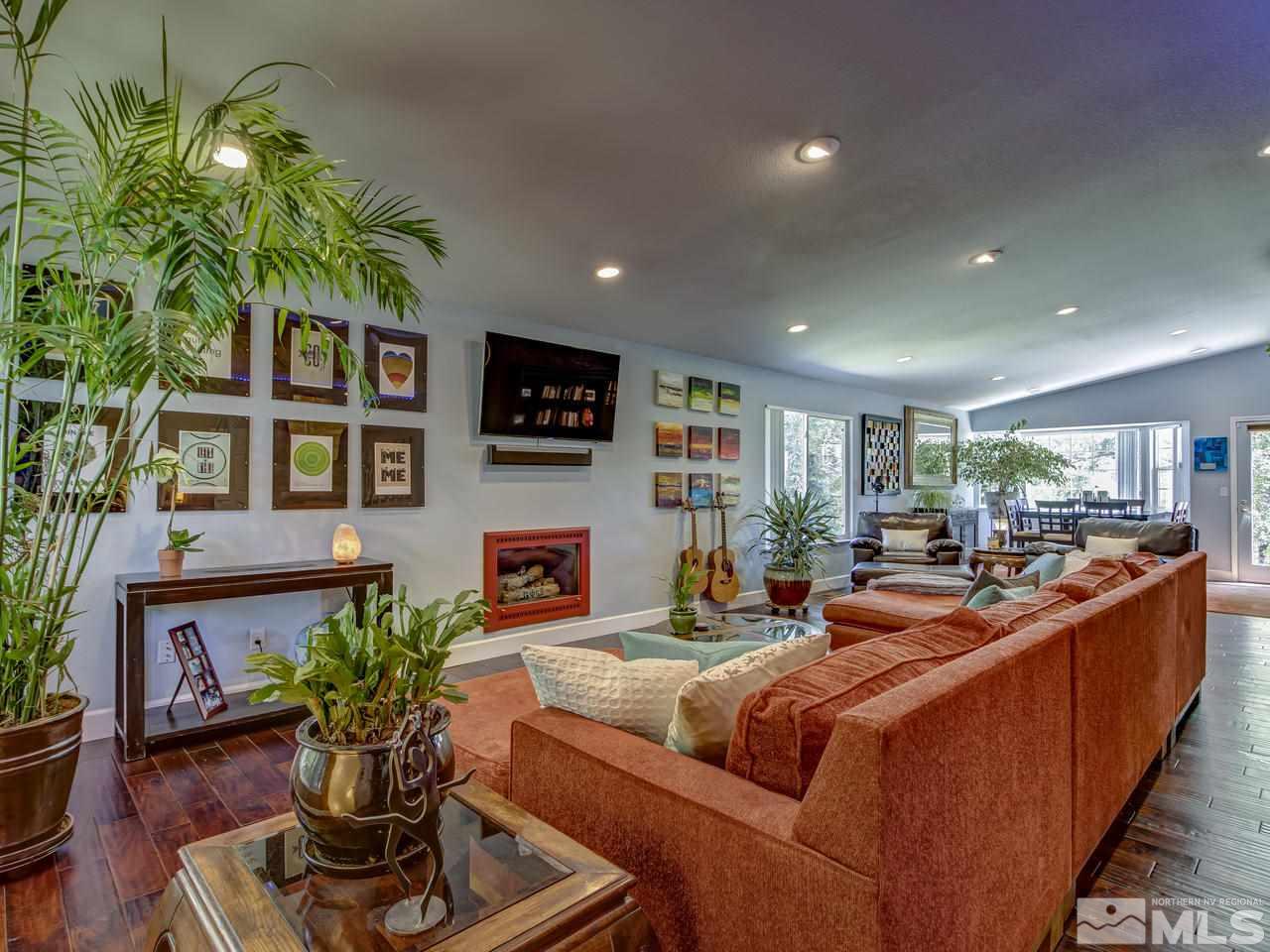 14410 Ghost Rider Drive Reno, NV 89511 - Photo 3 of 25 a living room with furniture kitchen and a potted plant