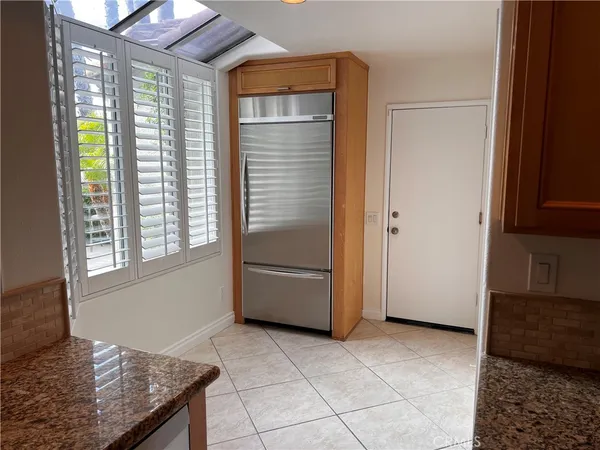 a view of kitchen and utility room