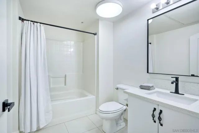 a view of a swimming pool with a lounge chairs