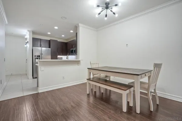 a view of kitchen with wooden floor and window
