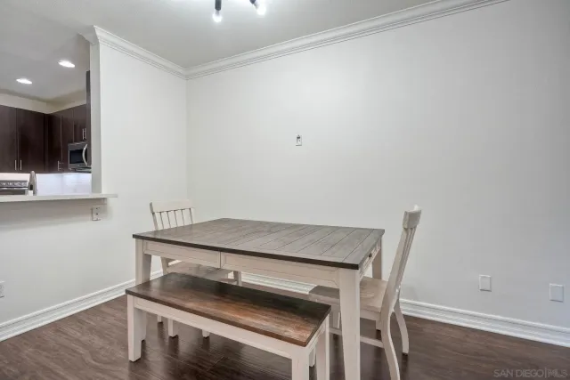 a room with a table and chairs