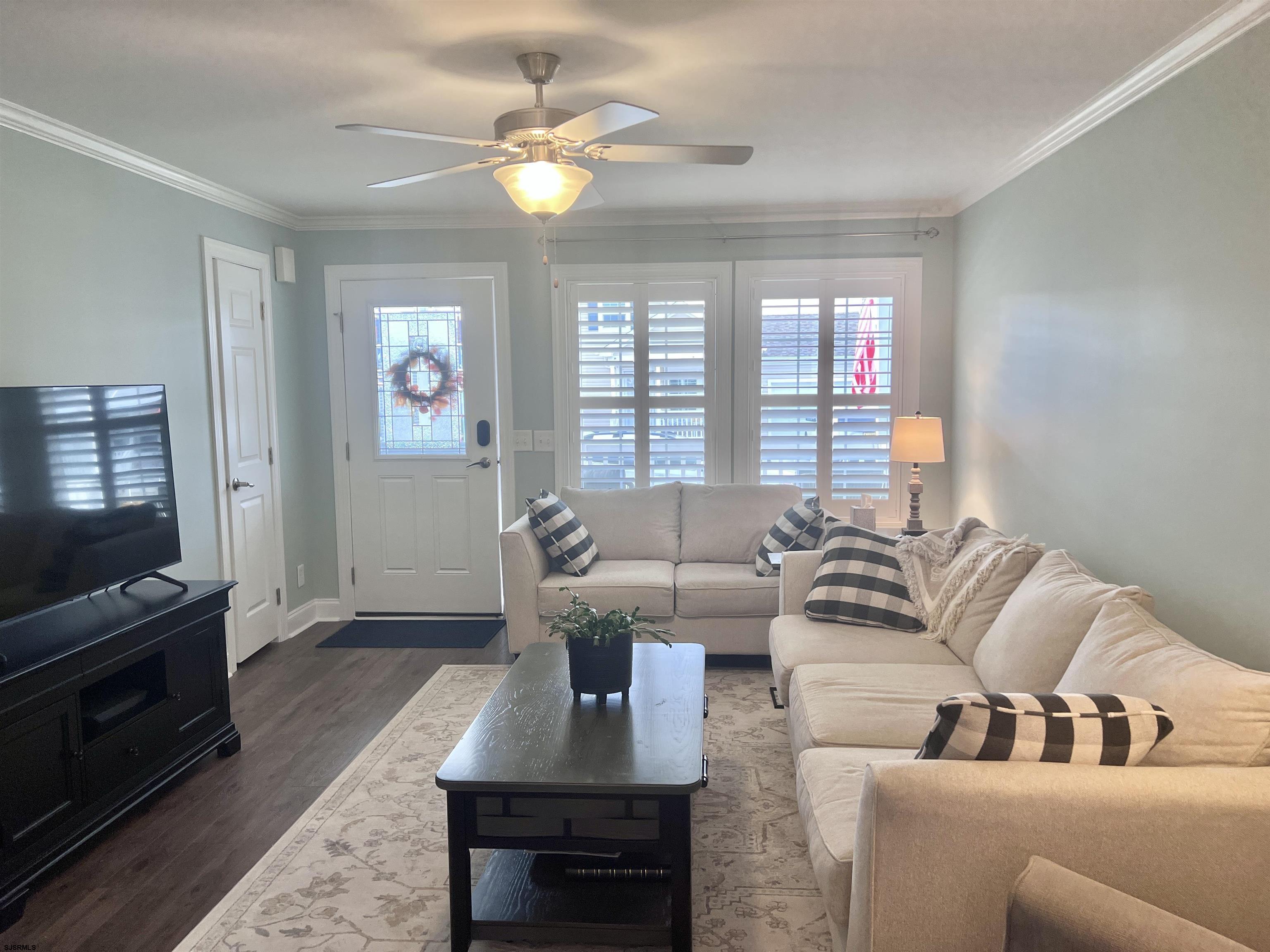 2058 Highway 9 Ocean View, NJ 08230 - Photo 13 of 37 a living room with furniture and a flat screen tv