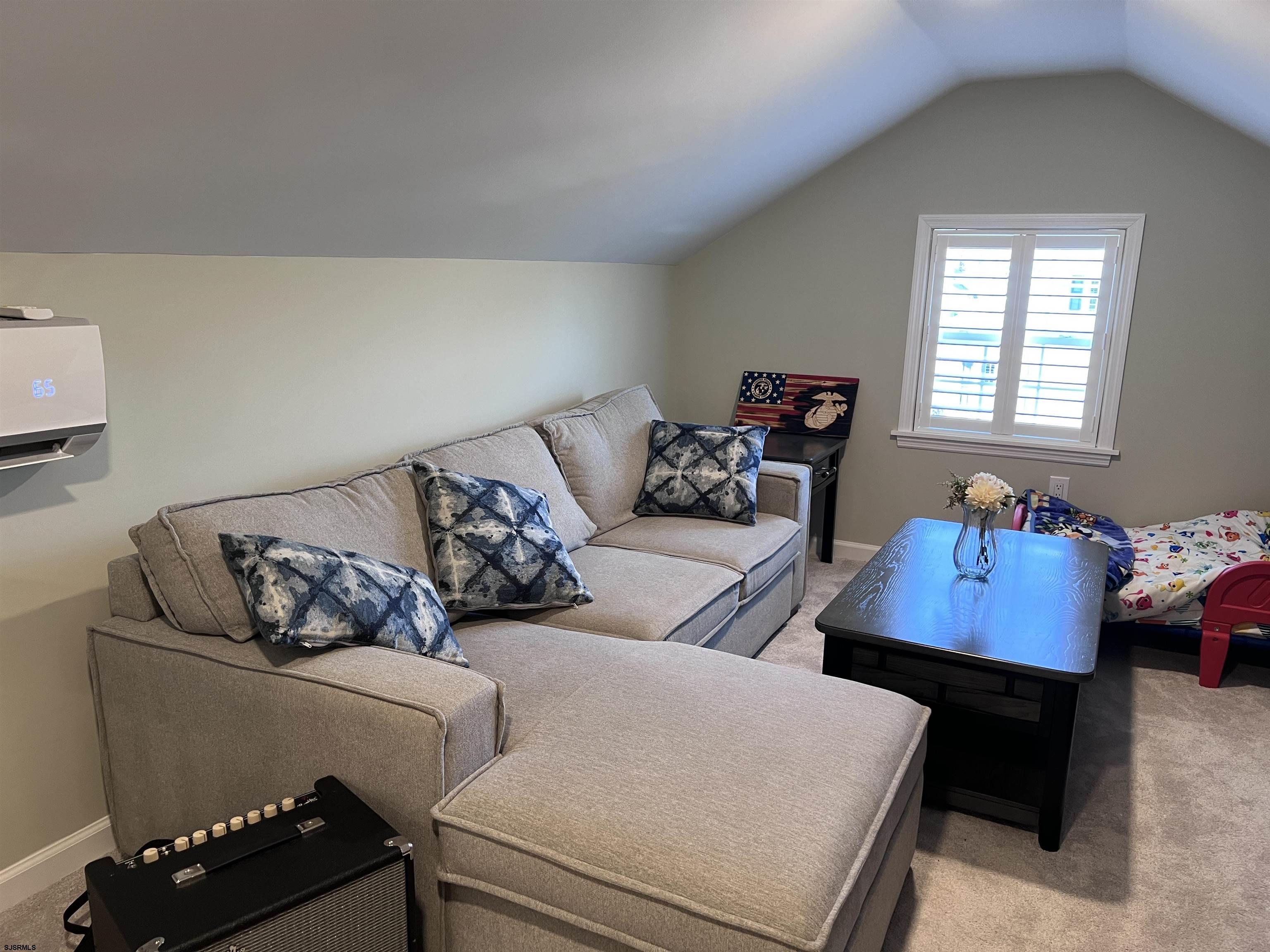 2058 Highway 9 Ocean View, NJ 08230 - Photo 32 of 37 a living room with furniture and a window