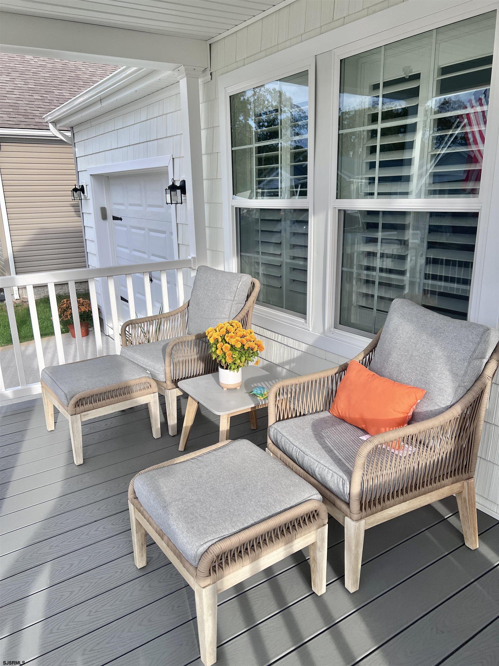 2058 Highway 9 Ocean View, NJ 08230 - Photo 5 of 37 a outdoor space with patio the couches and a dining table with the couches and wooden floor