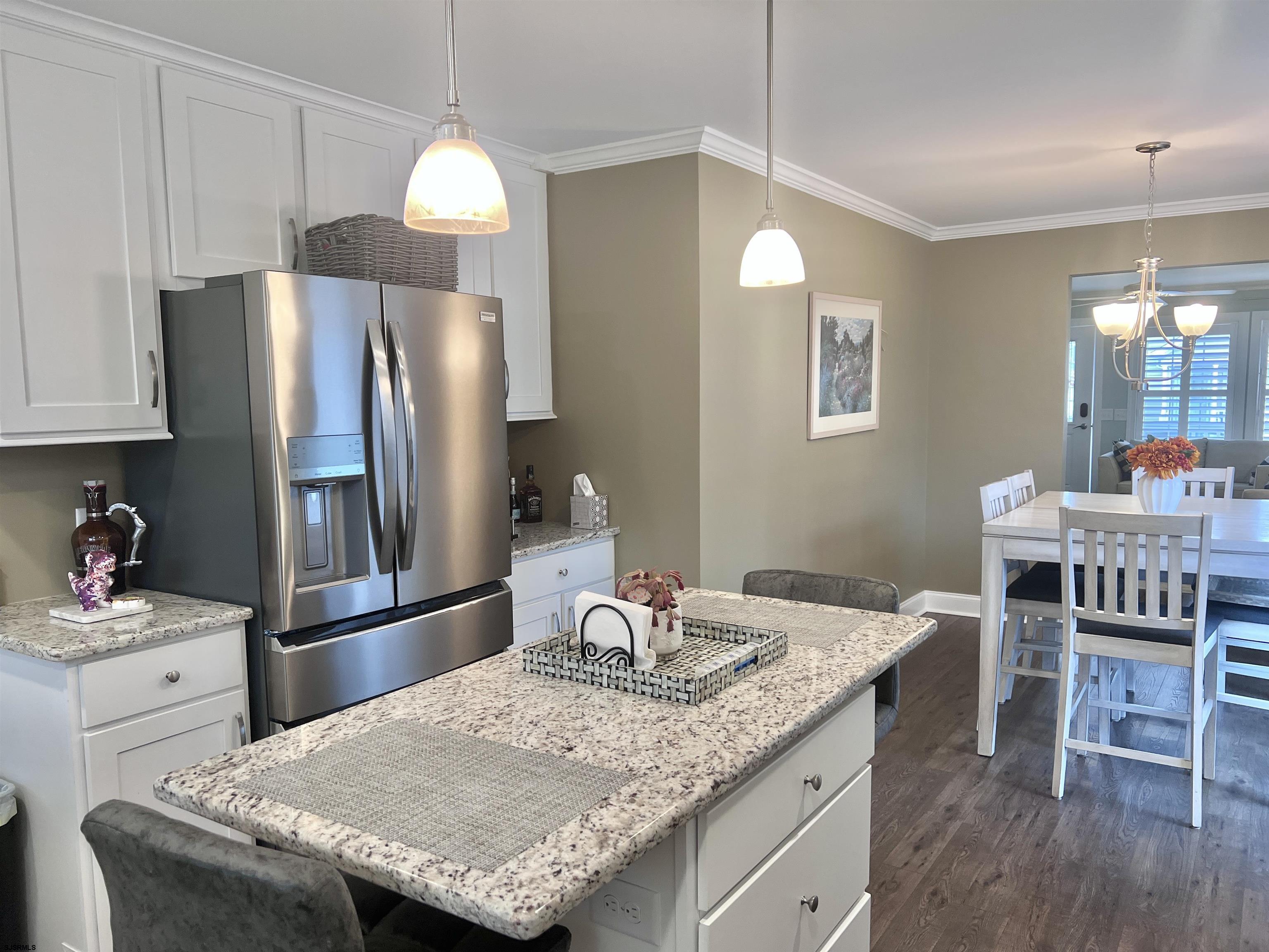 2058 Highway 9 Ocean View, NJ 08230 - Photo 8 of 37 a kitchen with granite countertop kitchen island stainless steel appliances a sink stove and refrigerator