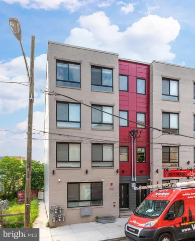 a car parked in front of a building