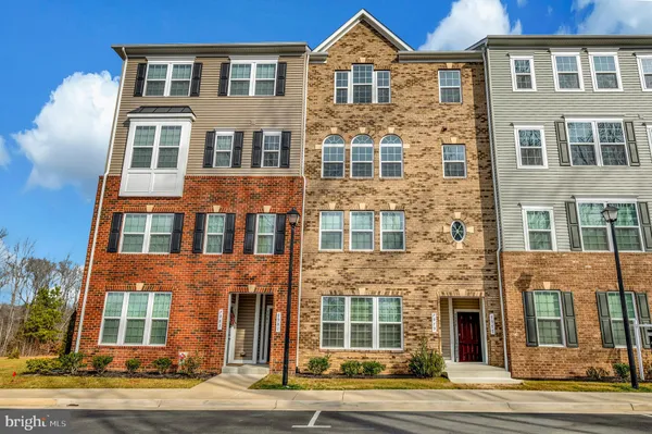 a front view of a multi story residential apartment building