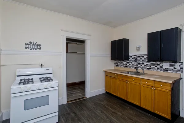 a bathroom with a sink a bath tub and a shower