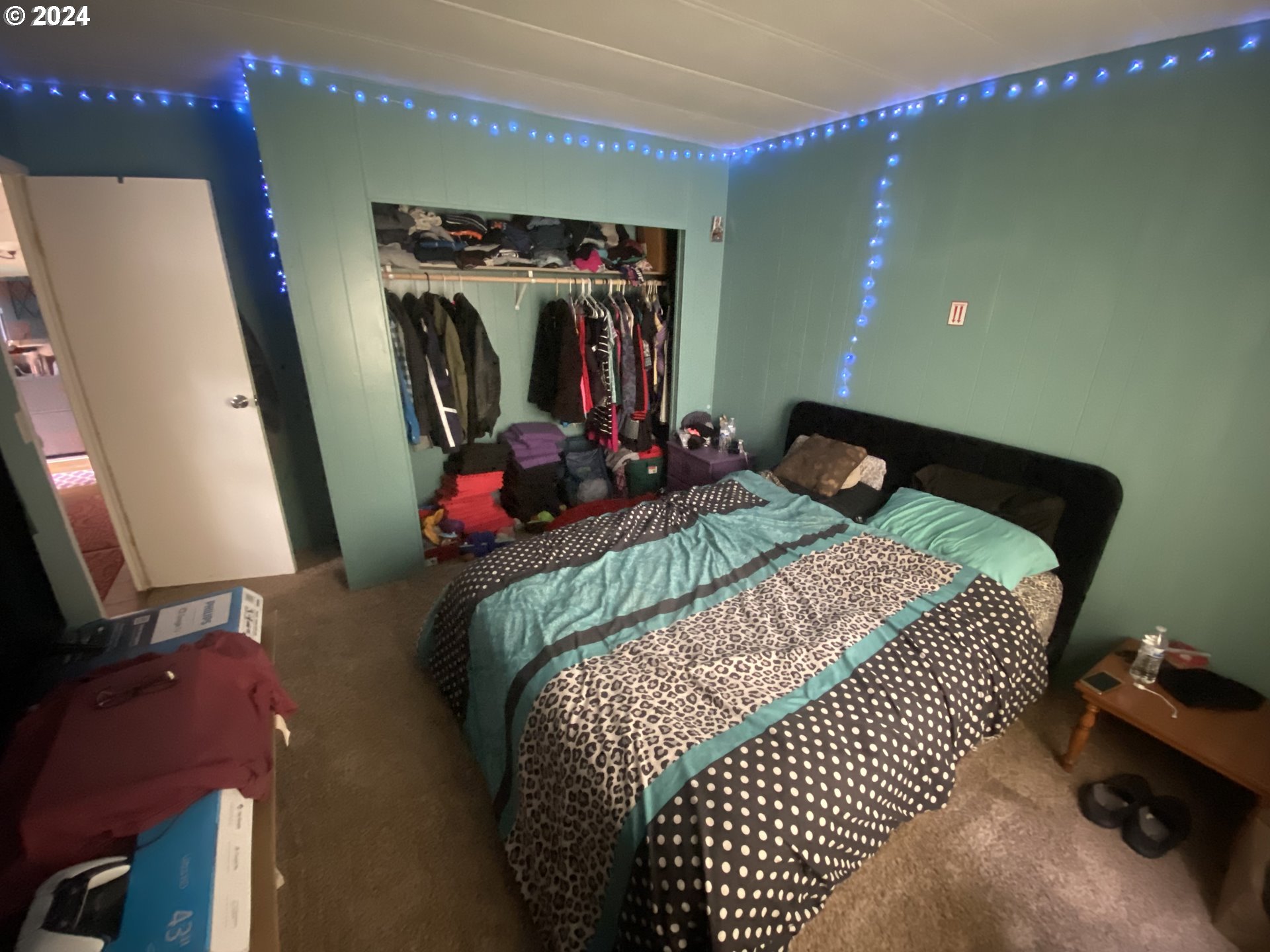 237 Waite Street Eugene, OR 97402 - Photo 12 of 17 a bedroom with a bed and a mirror